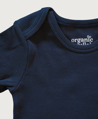 Dybblå kortærmet rib bodystocking i Gots-certificeret økologisk bomuld fra Organic Lullaby
