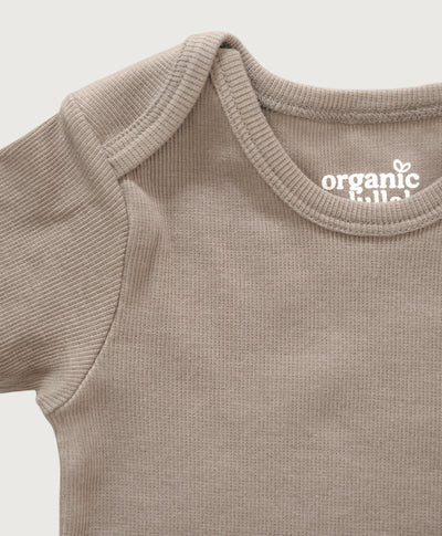 Beige kortærmet rib bodystocking i Gots-certificeret økologisk bomuld fra Organic Lullaby