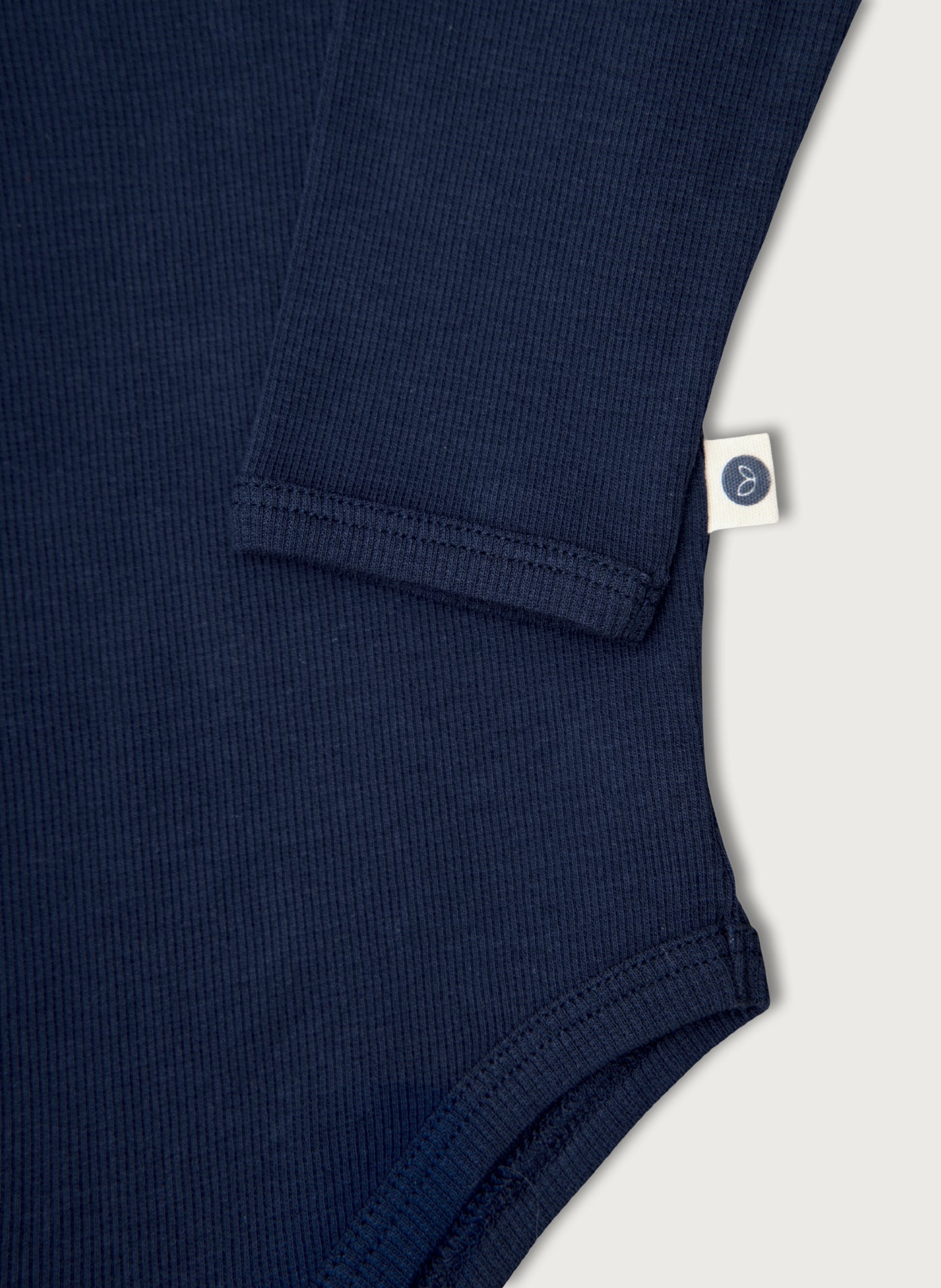 Langærmet blå rib bodystocking i Gots-certificeret økologisk bomuld fra Organic Lullaby